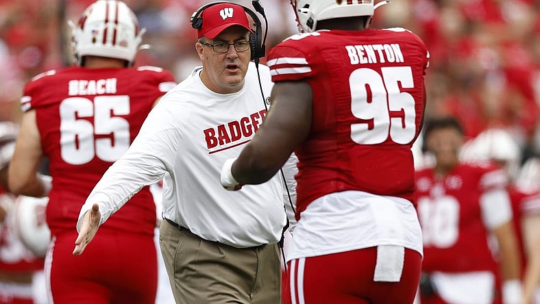 Sep 17, 2022; Madison, Wisconsin, USA;  Wisconsin Badgers head coach Paul Chryst celebrates following a touchdown during the first quarter against the New Mexico State Aggies at Camp Randall Stadium. Mandatory Credit: Jeff Hanisch-USA TODAY Sports