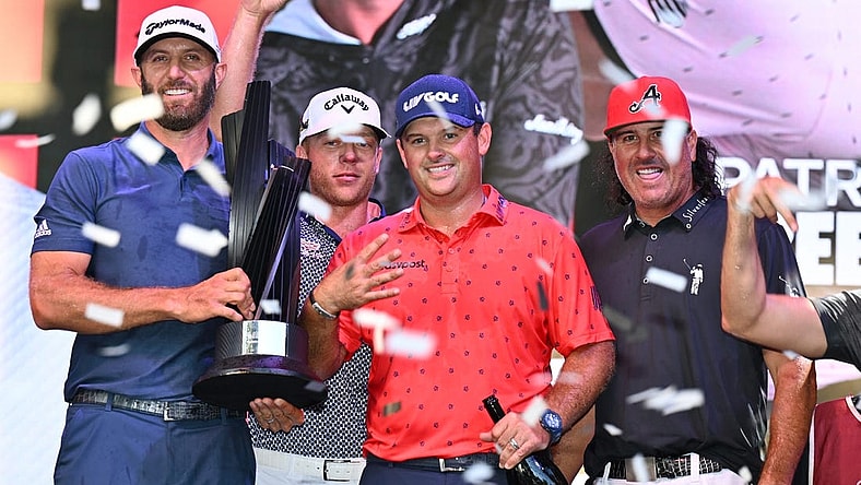 Sep 18, 2022; Chicago, Illinois, USA; From left, Dustin Johnson, Talor Gooch, Patrick Reed and Pat Perez celebrate their team win after the final round of the Invitational Chicago LIV Golf tournament at Rich Harvest Farms. Mandatory Credit: Jamie Sabau-USA TODAY Sports