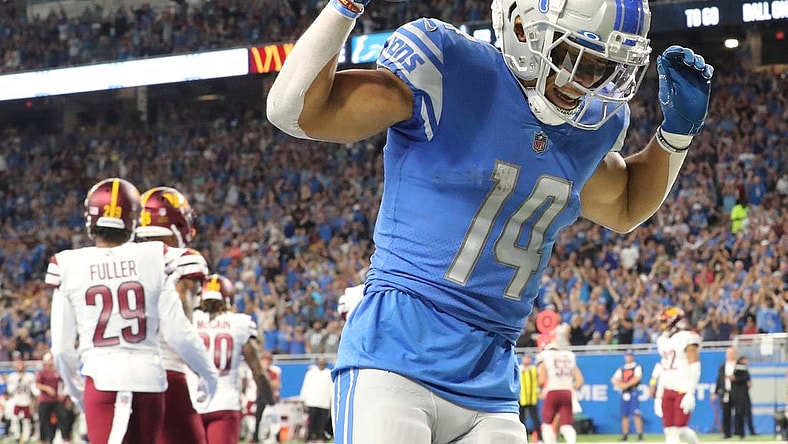 Detroit Lions wide receiver Amon-Ra St. Brown celebrates his touchdown catch against the Washington Commanders during the first half at Ford Field, Sept. 18, 2022.

Nfl Washington Commanders At Detroit Lions