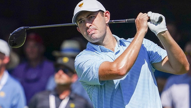 Sep 22, 2022; Charlotte, North Carolina, USA; Team USA golfer Patrick Cantlay hits his tee shot on the first hole during the foursomes match play of the Presidents Cup golf tournament at Quail Hollow Club. Mandatory Credit: Peter Casey-USA TODAY Sports