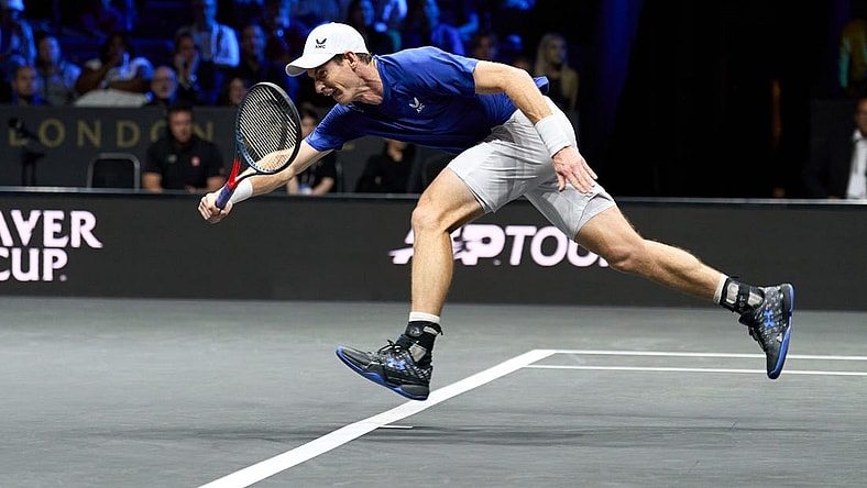 Sep 23, 2022; London, United Kingdom;  Andy Murray (GBR) plays a shot against Alex De Minaur (AUS) in his Laver Cup tennis match.  Mandatory Credit: Peter van den Berg-USA TODAY Sports