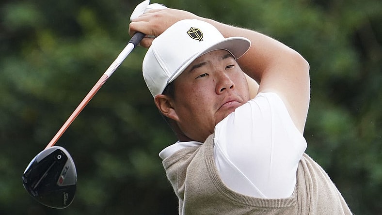 Sep 24, 2022; Charlotte, North Carolina, USA; International Team golfer Sungjae Im hits his tee shot on the 10th hole during the foursomes match play of the Presidents Cup golf tournament at Quail Hollow Club. Mandatory Credit: Peter Casey-USA TODAY Sports