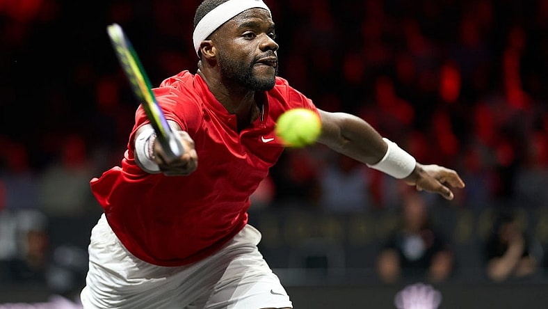 Sep 24, 2022; London, United Kingdom;Frances Tiafoe (USA) plays a shot against Novak Djokovic (SRB) in a Laver Cup singles match.  Mandatory Credit: Peter van den Berg-USA TODAY Sports
