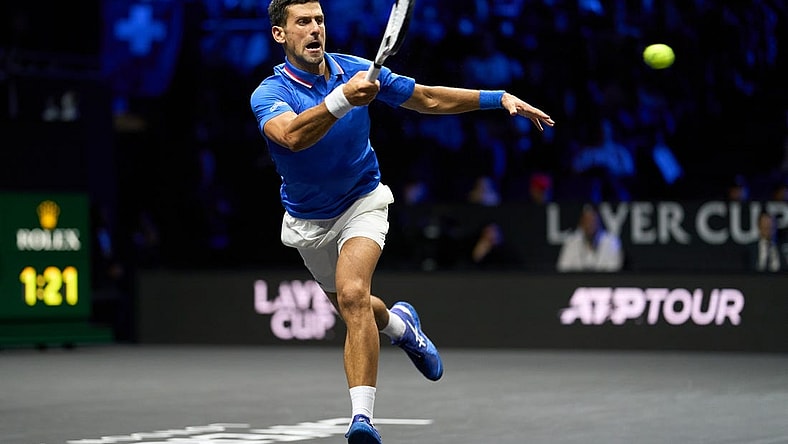 Sep 25, 2022; London, United Kingdom; Novak Djokovic (SRB) plays a shot against Felix Auger-Aliassime (CAN) in Lavers Cup singles. Mandatory Credit: Peter van den Berg-USA TODAY Sports