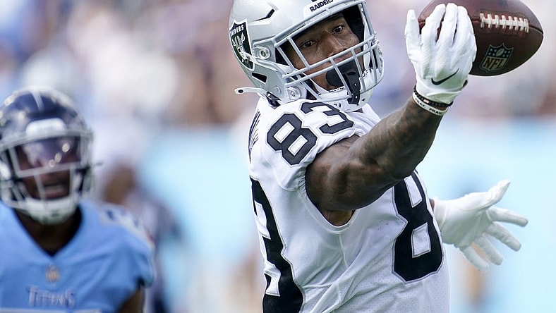 Sep 25, 2022; Nashville, Tennessee, USA; Las Vegas Raiders tight end Darren Waller (83) just misses a catch during the second quarter against the Tennessee Titans at Nissan Stadium. Mandatory Credit: Andrew Nelles-USA TODAY Sports