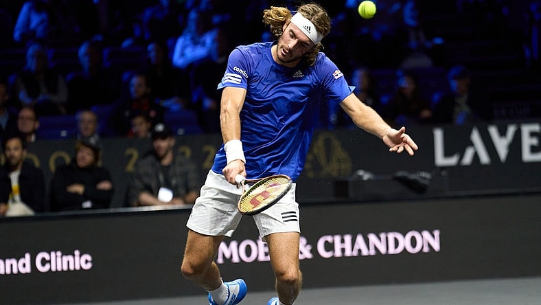 Sep 25, 2022; London, United Kingdom; Stefanos Tsitsipas (GRE) plays a shot against Frances Tiafoe (USA) in Lavers Cup singles. Mandatory Credit: Peter van den Berg-USA TODAY Sports