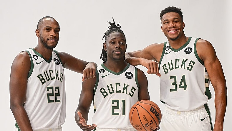 Sep 25, 2022; Milwaukee, WI, USA;  Milwaukee Bucks forward Khris Middleton (22), guard Jrue Holiday (21) and forward Giannis Antetokounmpo (34) pose for a picture during media day at the Fiserv Forum.Mandatory Credit: Benny Sieu-USA TODAY Sports