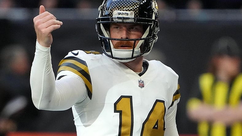Oct 2, 2022; London, United Kingdom; New Orleans Saints quarterback Andy Dalton (14) gestures in the second half against the Minnesota Vikings during an NFL International Series game at Tottenham Hotspur Stadium. The Vikings defeated the Saints 28-25. Mandatory Credit: Kirby Lee-USA TODAY Sports