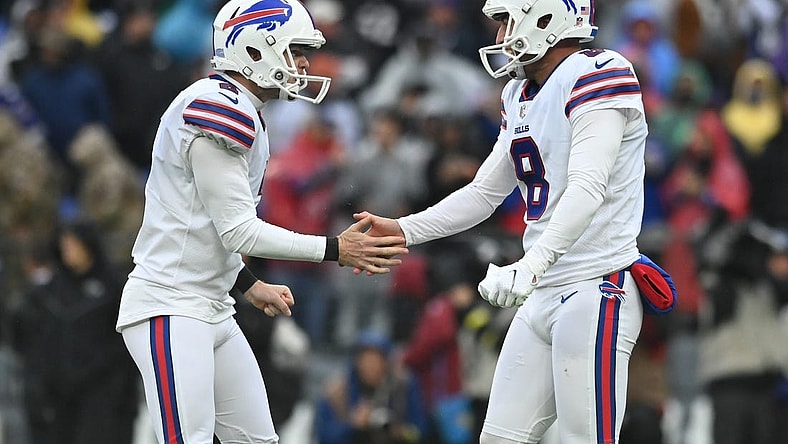Oct 2, 2022; Baltimore, Maryland, USA; Buffalo Bills place kicker Tyler Bass (2) celebrates with punter Sam Martin (8) after kicking the game winning field goal with time expiring against the Baltimore Ravens at M&T Bank Stadium. Mandatory Credit: Tommy Gilligan-USA TODAY Sports