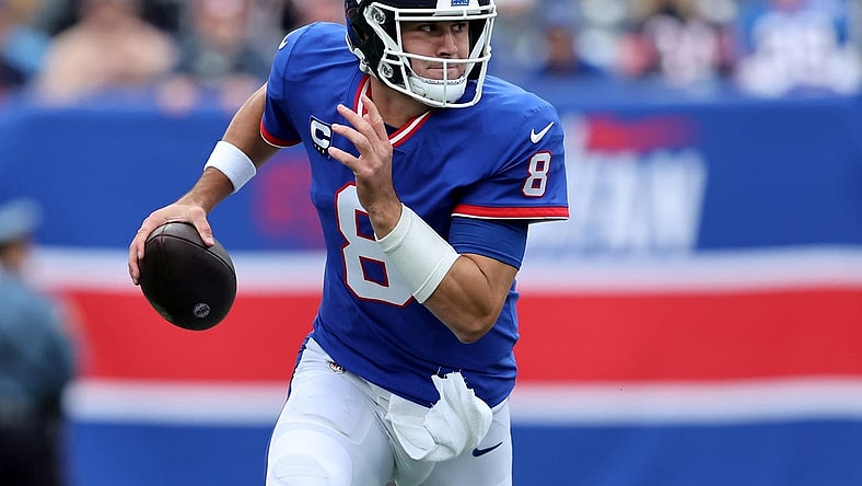 Oct 2, 2022; East Rutherford, New Jersey, USA; New York Giants quarterback Daniel Jones (8) looks to pass against the Chicago Bears during the first quarter at MetLife Stadium. Mandatory Credit: Brad Penner-USA TODAY Sports
