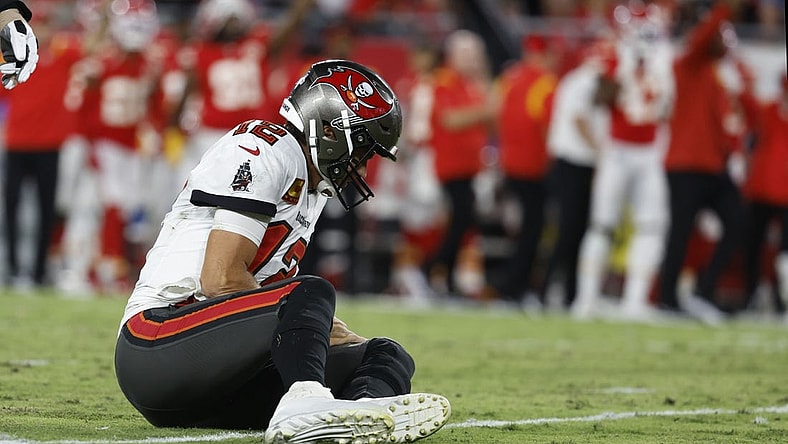 Oct 2, 2022; Tampa, Florida, USA; Tampa Bay Buccaneers quarterback Tom Brady (12) reacts after he was sacked and fumbled the ball against the Kansas City Chiefs during the first half at Raymond James Stadium. Mandatory Credit: Kim Klement-USA TODAY Sports