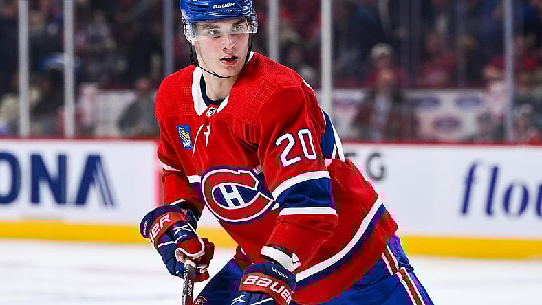 Oct 3, 2022; Montreal, Quebec, CAN; Montreal Canadiens left wing Juraj Slafkovsky (20) looks towards his left during the second period at Bell Centre. Mandatory Credit: David Kirouac-USA TODAY Sports