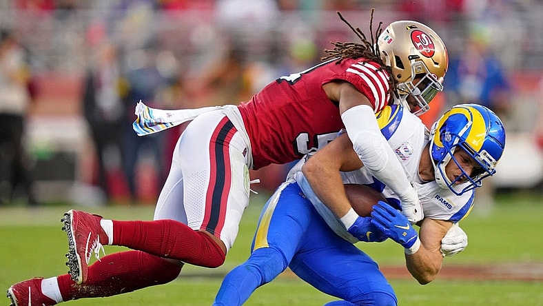 Oct 3, 2022; Santa Clara, California, USA; San Francisco 49ers linebacker Fred Warner (54) tackles Los Angeles Rams wide receiver Cooper Kupp (10) during the second quarter at Levi's Stadium. Mandatory Credit: Kyle Terada-USA TODAY Sports