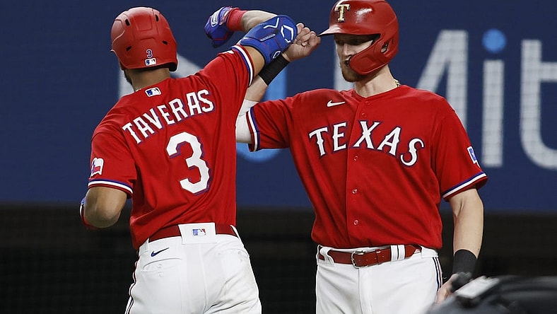 Oct 4, 2022; Arlington, Texas, USA; Texas Rangers center fielder Leody Taveras (3) is congratulated by catcher Sam Huff (55) after hitting a two-run home run against the New York Yankees in the fifth inning at Globe Life Field. Mandatory Credit: Tim Heitman-USA TODAY Sports