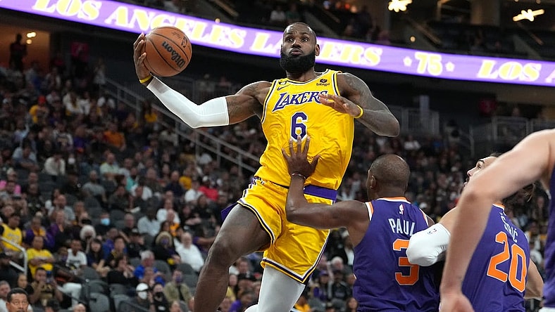 Oct 5, 2022; Las Vegas, Nevada, USA; Los Angeles Lakers forward LeBron James (6) shoots against Phoenix Suns guard Chris Paul (3) during a preseason game at T-Mobile Arena. Mandatory Credit: Stephen R. Sylvanie-USA TODAY Sports