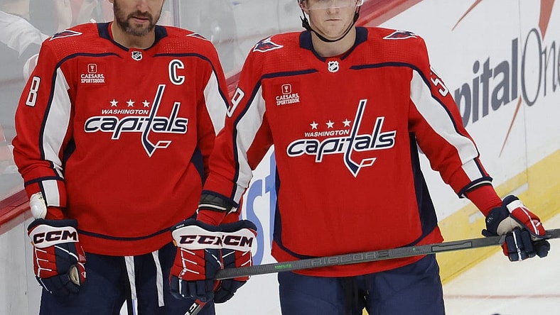 Oct 5, 2022; Washington, District of Columbia, USA; Washington Capitals left wing Alex Ovechkin (8) stands with Capitals center Aliaksei Protas (59) on ice prior to the Capitals' game against the Detroit Red Wings at Capital One Arena. Mandatory Credit: Geoff Burke-USA TODAY Sports