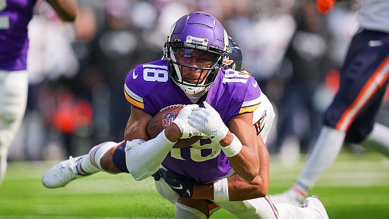 Oct 9, 2022; Minneapolis, Minnesota, USA;  Minnesota Vikings wide receiver Justin Jefferson (18) catches a pass against the Chicago Bears in the first quarter at U.S. Bank Stadium. Mandatory Credit: Brad Rempel-USA TODAY Sports