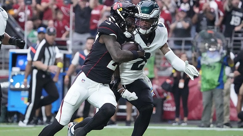 Oct 9, 2022; Glendale, Arizona, U.S.;  Arizona Cardinals wide receiver Marquise Brown (2) runs for a touchdown after a catch against Philadelphia Eagles cornerback Darius Slay (2) during the second quarter at State Farm Stadium. Mandatory Credit: Michael Chow-USA TODAY Sports