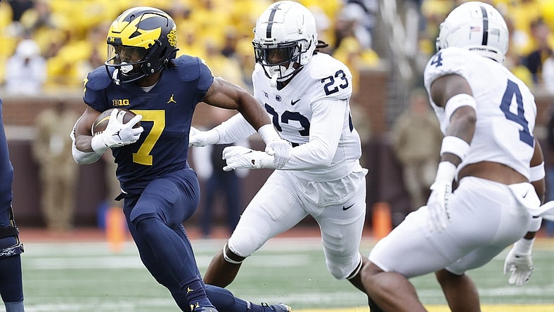 Oct 15, 2022; Ann Arbor, Michigan, USA;  Michigan Wolverines running back Donovan Edwards (7) rushes in the first half against the Penn State Nittany Lions at Michigan Stadium. Mandatory Credit: Rick Osentoski-USA TODAY Sports
