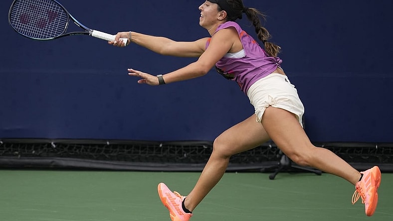 Oct 15, 2022; San Diego, California, US; Jessica Pegula of the United States hits a shot against Iga Swiatek of Poland during the San Diego Open at Barnes Tennis Center. Mandatory Credit: Ray Acevedo-USA TODAY Sports
