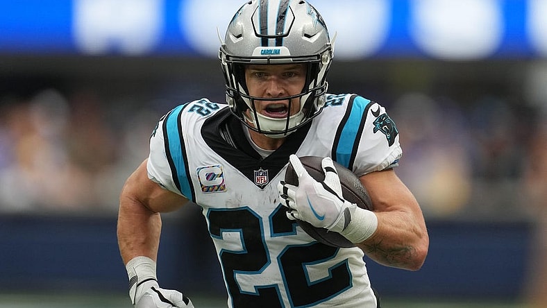 Oct 16, 2022; Inglewood, California, USA; Carolina Panthers running back Christian McCaffrey (22) carries the ball against the Los Angeles Rams in the first half at SoFi Stadium. Mandatory Credit: Kirby Lee-USA TODAY Sports