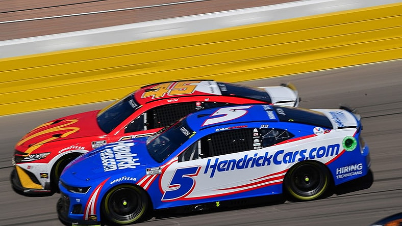 Oct 16, 2022; Las Vegas, Nevada, USA; NASCAR Cup Series driver Kyle Larson (5) and driver Bubba Wallace (45) drive for position during the South Point 400 at Las Vegas Motor Speedway. Mandatory Credit: Gary A. Vasquez-USA TODAY Sports