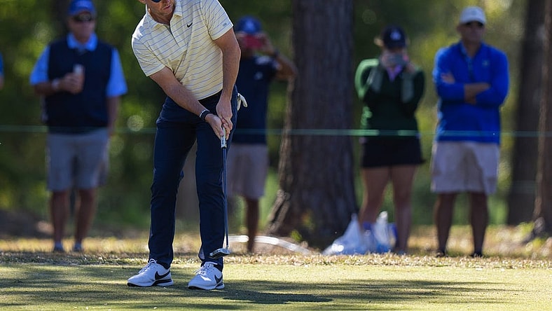 Oct 22, 2022; Ridgeland, South Carolina, USA; Rory McIlroy putts on the first green during the third round of THE CJ CUP in South Carolina golf tournament. Mandatory Credit: David Yeazell-USA TODAY Sports