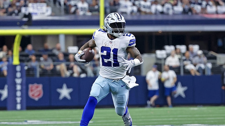Oct 23, 2022; Arlington, Texas, USA;  Dallas Cowboys running back Ezekiel Elliott (21) runs with the ball during the first half against the Detroit Lions at AT&T Stadium. Mandatory Credit: Kevin Jairaj-USA TODAY Sports