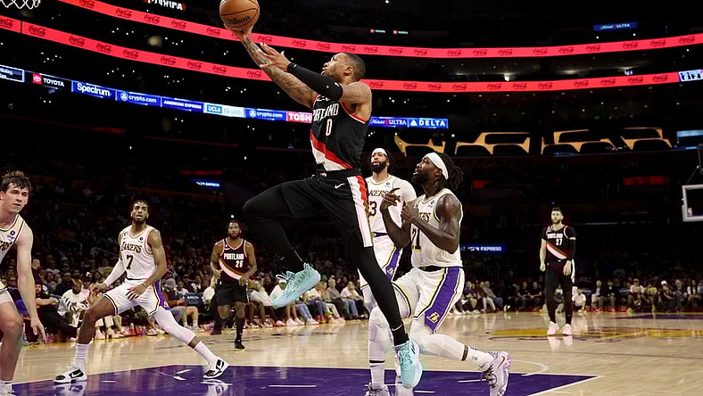 Oct 23, 2022; Los Angeles, California, USA; Portland Trail Blazers guard Damian Lillard (0) goes to the basket during the second quarter against the Los Angeles Lakers at Crypto.com Arena. Mandatory Credit: Kiyoshi Mio-USA TODAY Sports
