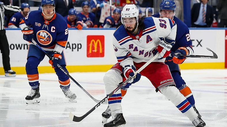 Oct 26, 2022; Elmont, New York, USA; New York Rangers center Mika Zibanejad (93) skates with the puck against the New York Islanders during the third period at UBS Arena. Mandatory Credit: Tom Horak-USA TODAY Sports