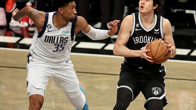 Oct 27, 2022; Brooklyn, New York, USA; Brooklyn Nets forward Yuta Watanabe (18) controls the ball against Dallas Mavericks center Christian Wood (35) during the first quarter at Barclays Center. Mandatory Credit: Brad Penner-USA TODAY Sports
