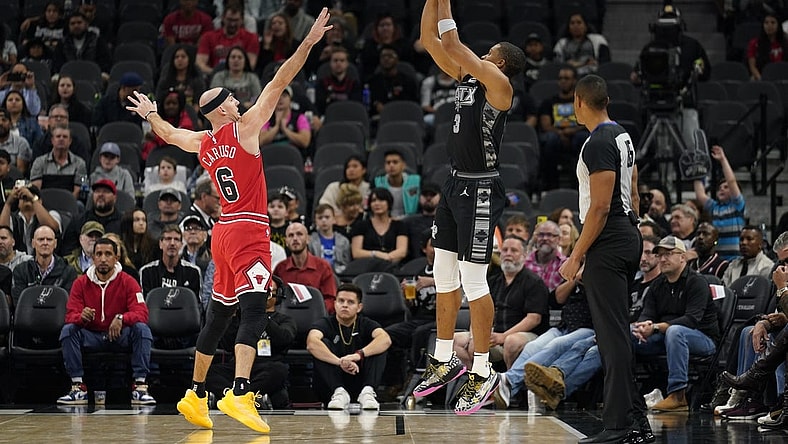 Oct 28, 2022; San Antonio, Texas, USA; San Antonio Spurs forward Keldon Johnson (3) shoots over Chicago Bulls guard Alex Caruso (6) during the first half at AT&T Center. Mandatory Credit: Scott Wachter-USA TODAY Sports