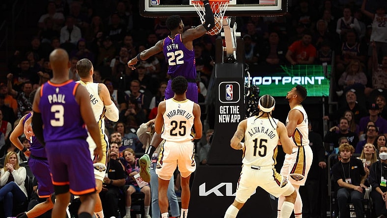 Oct 28, 2022; Phoenix, Arizona, USA; Phoenix Suns center Deandre Ayton (22) dunks for the basket against the New Orleans Pelicans during the first half at Footprint Center. Mandatory Credit: Mark J. Rebilas-USA TODAY Sports