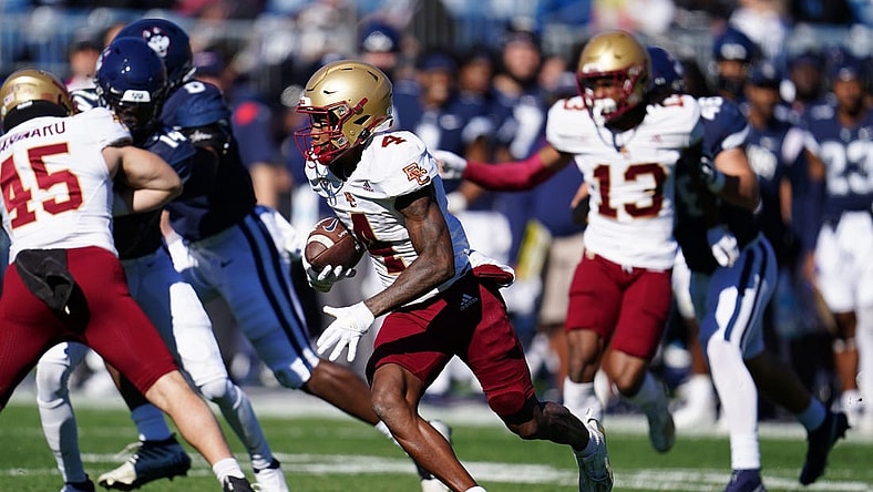 Boston College Eagles special teams Zay Flowers (4) returns the ball against the Connecticut Huskies in the second quarter at Rentschler Field at Pratt & Whitney Stadium. Mandatory Credit: David Butler II-USA TODAY Sports