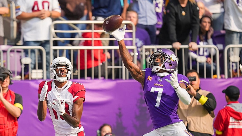 Oct 30, 2022; Minneapolis, Minnesota, USA; Minnesota Vikings cornerback Patrick Peterson (7) deflects a pass to Arizona Cardinals wide receiver A.J. Green (18) in the first quarter at U.S. Bank Stadium. Mandatory Credit: Brad Rempel-USA TODAY Sports