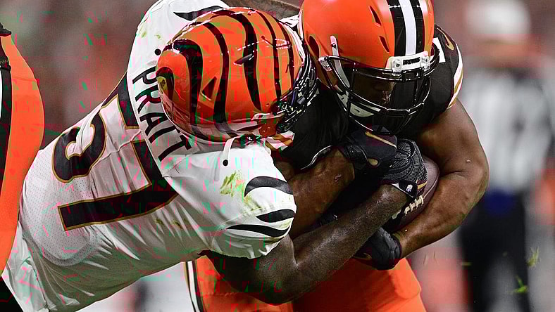 Oct 31, 2022; Cleveland, Ohio, USA; Cleveland Browns running back Nick Chubb (24) runs through Cincinnati Bengals linebacker Germaine Pratt (57) to score a two-point conversion in the second quarter at FirstEnergy Stadium. Mandatory Credit: David Dermer-USA TODAY Sports