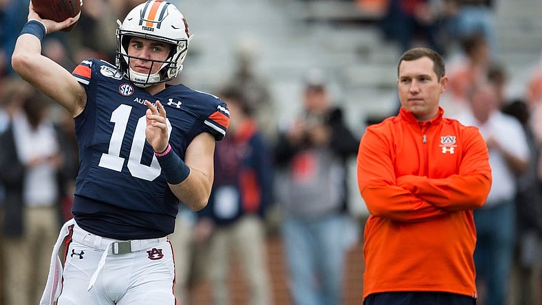 Auburn quarterback Bo Nix (10) throws the ball as Auburn offensive coordinator Kenny Dillingham watches on during warm ups at Jordan-Hare Stadium in Auburn, Ala., on Saturday, Nov. 23, 2019.
Jc Auburnsamford 19