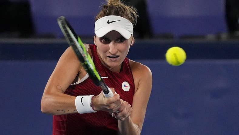Jul 31, 2021; Tokyo, Japan; Marketa Vondrousova (CZE) in action against Belinda Bencic (SUI) in the women's gold medal match during the Tokyo 2020 Olympic Summer Games at Ariake Tennis Park. Mandatory Credit: Robert Deutsch-USA TODAY Sports