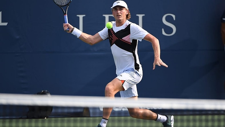Aug 7, 2021; Toronto, Ontario, Canada; Max Purcell of Australia plays a shot against Emilio Gomez of Ecuador in first round qualifying play for the National Bank Open at the Aviva Centre. Mandatory Credit: Dan Hamilton-USA TODAY Sports