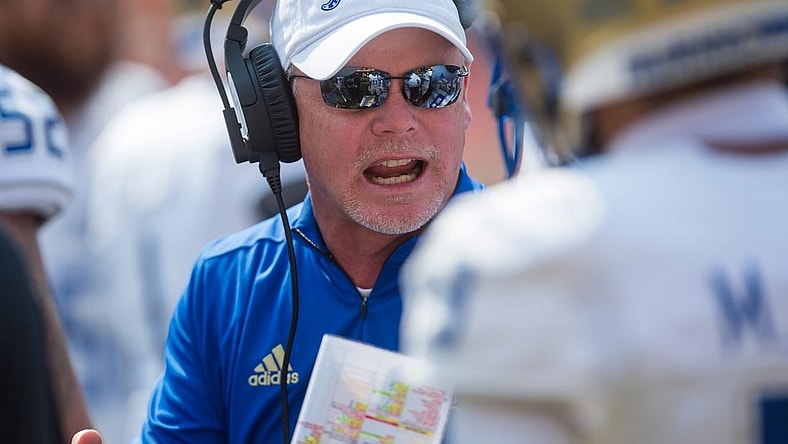 Sep 11, 2021; Stillwater, Oklahoma, USA;  Tulsa Golden Hurricane head coach Philip Montgomery talks to his players during a timeout in the first quarter against the Oklahoma State Cowboys at Boone Pickens Stadium. Mandatory Credit: Brett Rojo-USA TODAY Sports