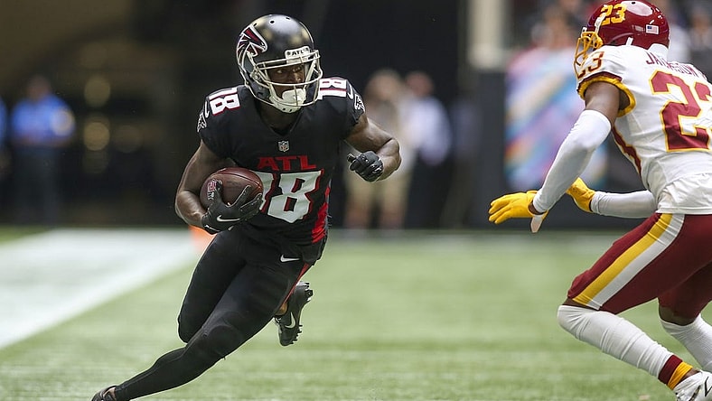 Oct 3, 2021; Atlanta, Georgia, USA; Atlanta Falcons wide receiver Calvin Ridley (18) runs after a catch against the Washington Football Team in the second quarter at Mercedes-Benz Stadium. Mandatory Credit: Brett Davis-USA TODAY Sports