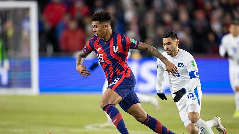 Jan 27, 2022; Columbus, Ohio, USA; United States defender Chris Richards (15) dribbles the ball while El Salvador midfielder Alexander Roldan (15) defends during a CONCACAF FIFA World Cup Qualifier soccer match at Lower.com Field. Mandatory Credit: Trevor Ruszkowski-USA TODAY Sports