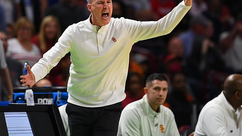 Mar 18, 2022; Greenville, SC, USA; Southern California Trojans head coach Andy Enfield reacts against the Miami Hurricanes during the first round of the 2022 NCAA Tournament at Bon Secours Wellness Arena. Mandatory Credit: Bob Donnan-USA TODAY Sports