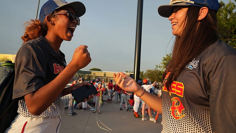 Riley Wilson, 14, left, and Laney Fukuoka, 15, California teammates on the Hurricanes share a laugh during the opening ceremony for Baseball for All, an organization focused on giving girls an opportunity to play baseball, at Hohokam Stadium in Mesa, Ariz. on Wednesday, July 20, 2022.

Baseball For All 17