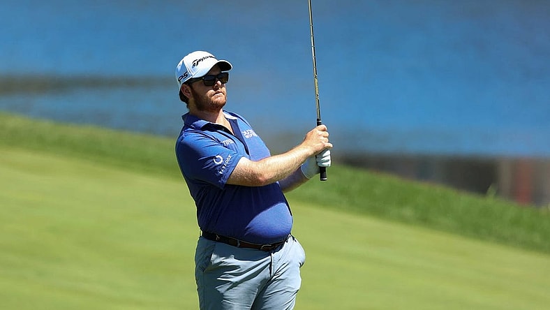 Jul 21, 2022; Blaine, Minnesota, USA; Harry Higgs hits an approach shot from the fairway on the 7th hole during the first round of the 3M Open golf tournament. Mandatory Credit: Matt Krohn-USA TODAY Sports
