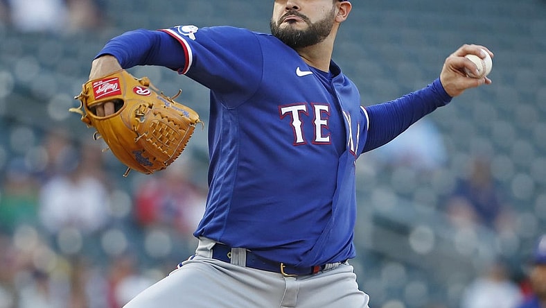 Aug 19, 2022; Minneapolis, Minnesota, USA; Texas Rangers starting pitcher Martin Perez (54) throws to the Minnesota Twins in the first inning at Target Field. Mandatory Credit: Bruce Kluckhohn-USA TODAY Sports
