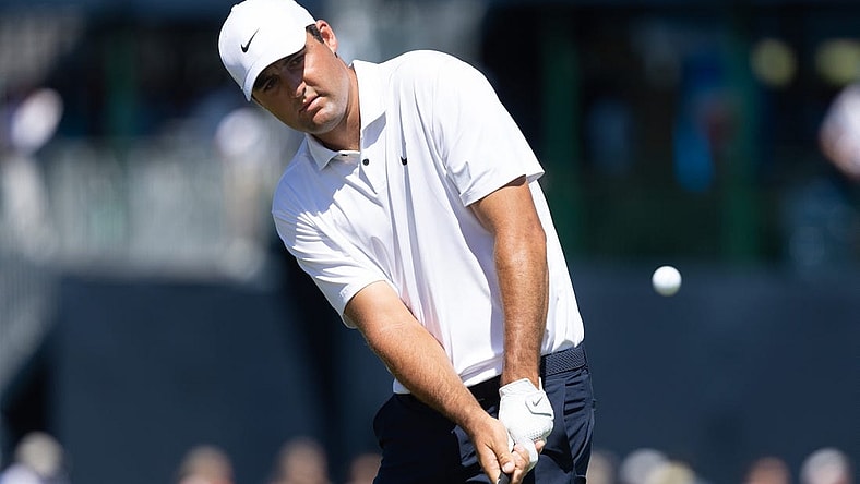 Aug 20, 2022; Wilmington, Delaware, USA; Scottie Scheffler chips onto the second green during the third round of the BMW Championship golf tournament. Mandatory Credit: Bill Streicher-USA TODAY Sports