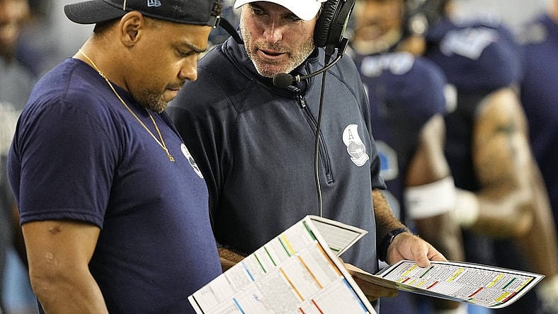 Aug 20, 2022; Toronto, Ontario, CAN; Toronto Argonauts head coach Ryan Dinwiddie talks to injured running back Andrew Harris (left) during the second half against the Calgary Stampeders at BMO Field. Mandatory Credit: John E. Sokolowski-USA TODAY Sports