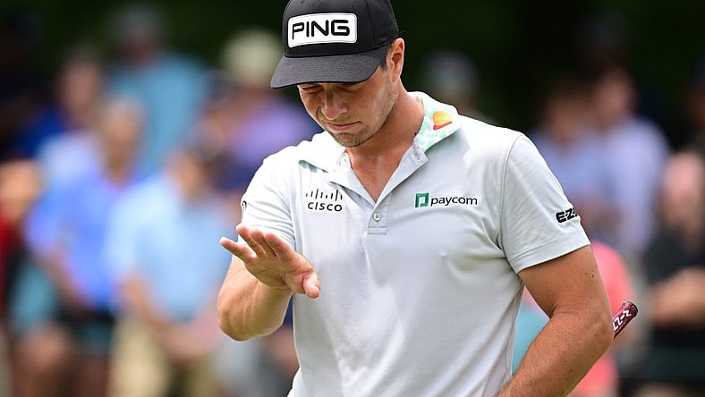 Aug 25, 2022; Atlanta, Georgia, USA; Viktor Hovland reads the 1st green during the first round of the TOUR Championship golf tournament. Mandatory Credit: Adam Hagy-USA TODAY Sports