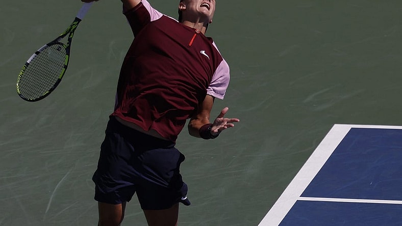 Sep 3, 2022; Flushing, NY, USA; Holger Rune (DEN) serves against Cameron Norrie (GBR) (not pictured) on day six of the 2022 U.S. Open tennis tournament at USTA Billie Jean King Tennis Center. Mandatory Credit: Geoff Burke-USA TODAY Sports